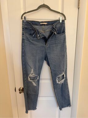 Levi’s Women's Distressed Straight Crop Jeans in Mid Blue
